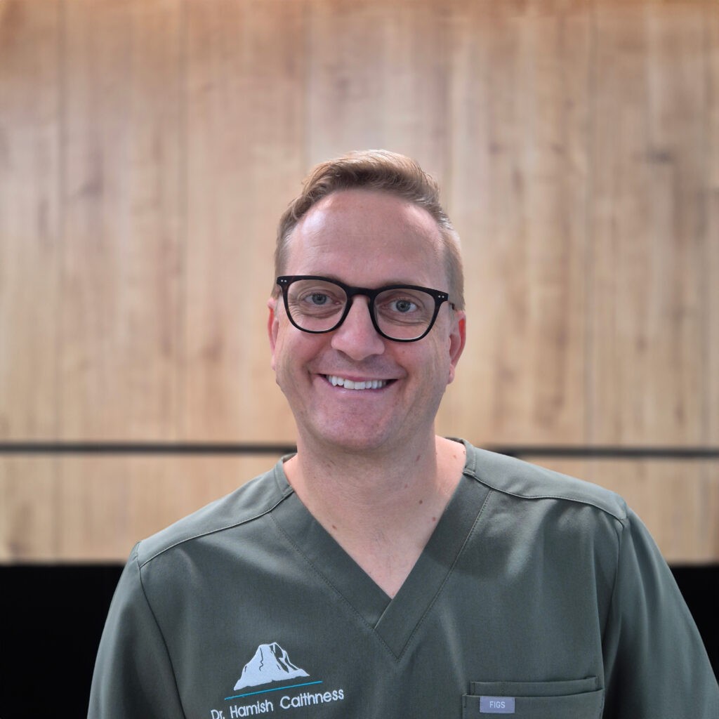 Portrait of Dr. Hamish Caithness, principal dentist and founder of Noosa Hinterland Dental in Pomona, providing expert dental care to families across the Cooroy and Noosa Hinterland region.