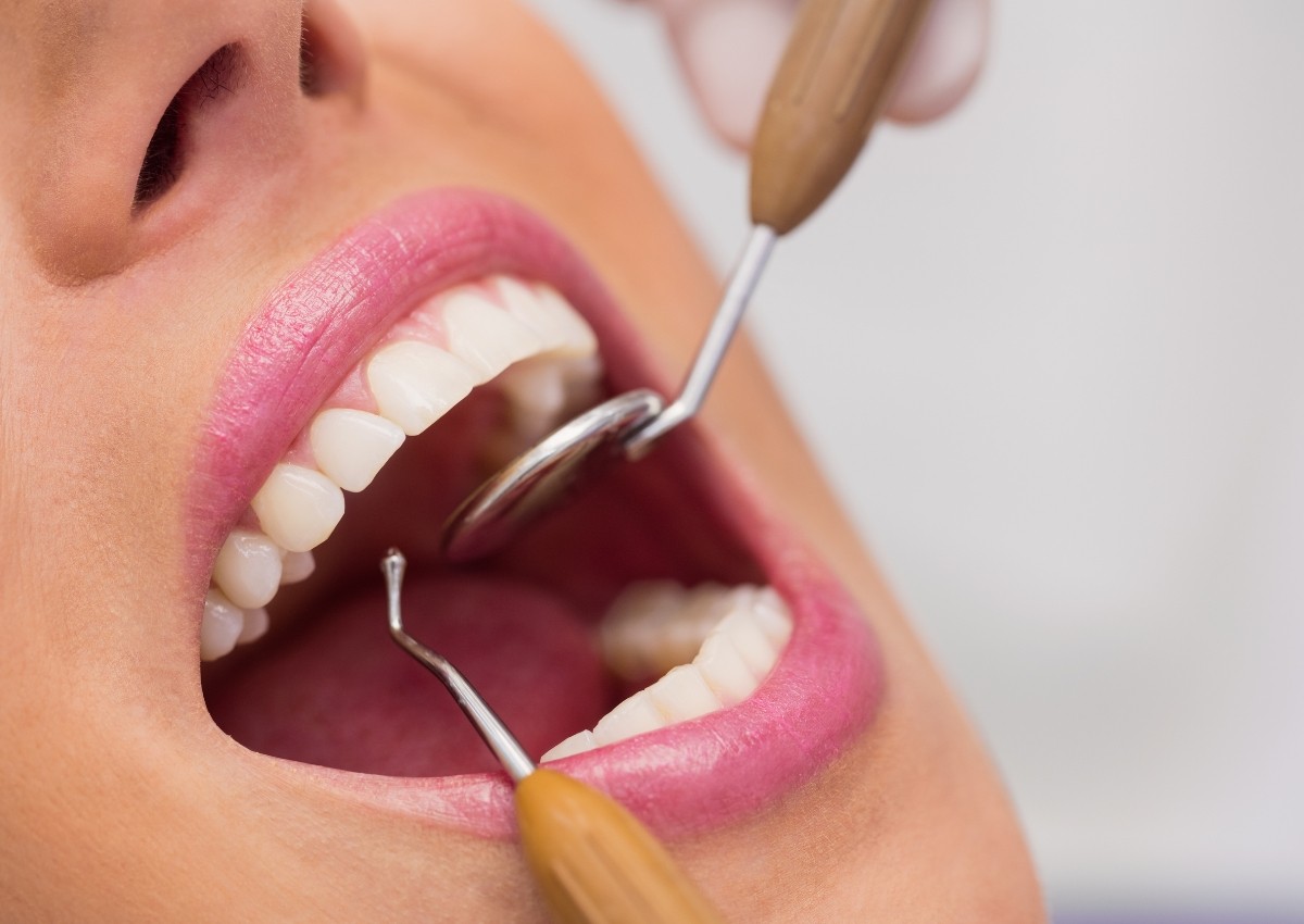 Pomona dentist performing expert dental examination on patient